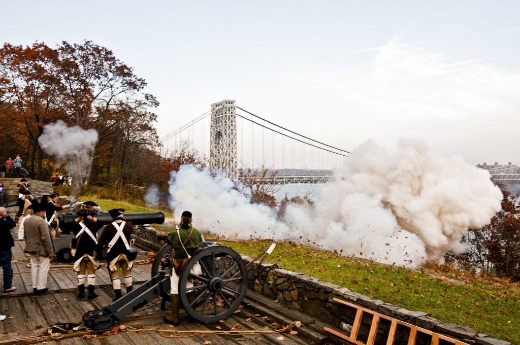 Live firing at Fort Lee Historic Park with the George Washington Bridge in the background.